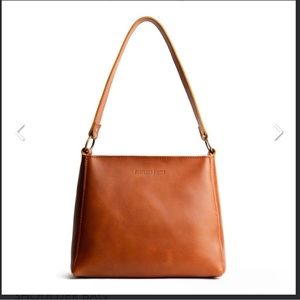 Portland Leather Co. 'ALMOST PERFECT' TRIANGLE SHOULDER BAG in Honey EUC tassel